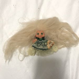 Vintage troll doll with green dress and shoes